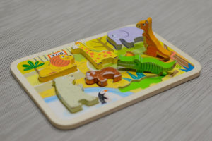Kids puzzle board with animal shapes